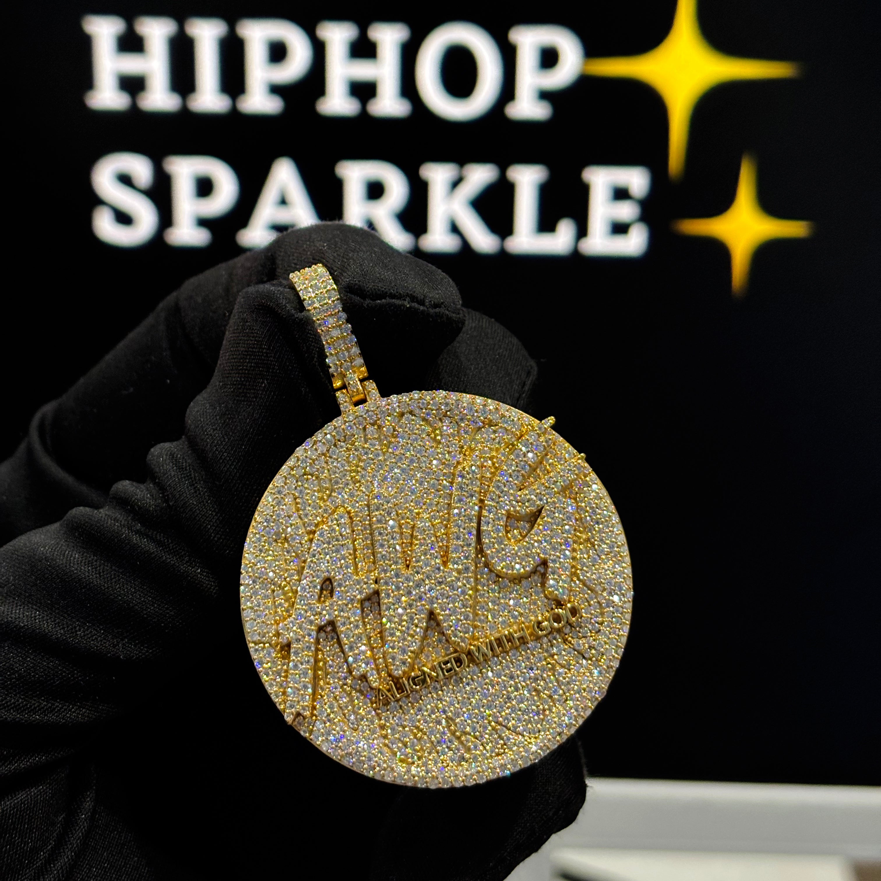 Gold round AWG Aligned With God pendant fully iced with moissanite stones held in glove – Hip Hop Sparkle jewelry
