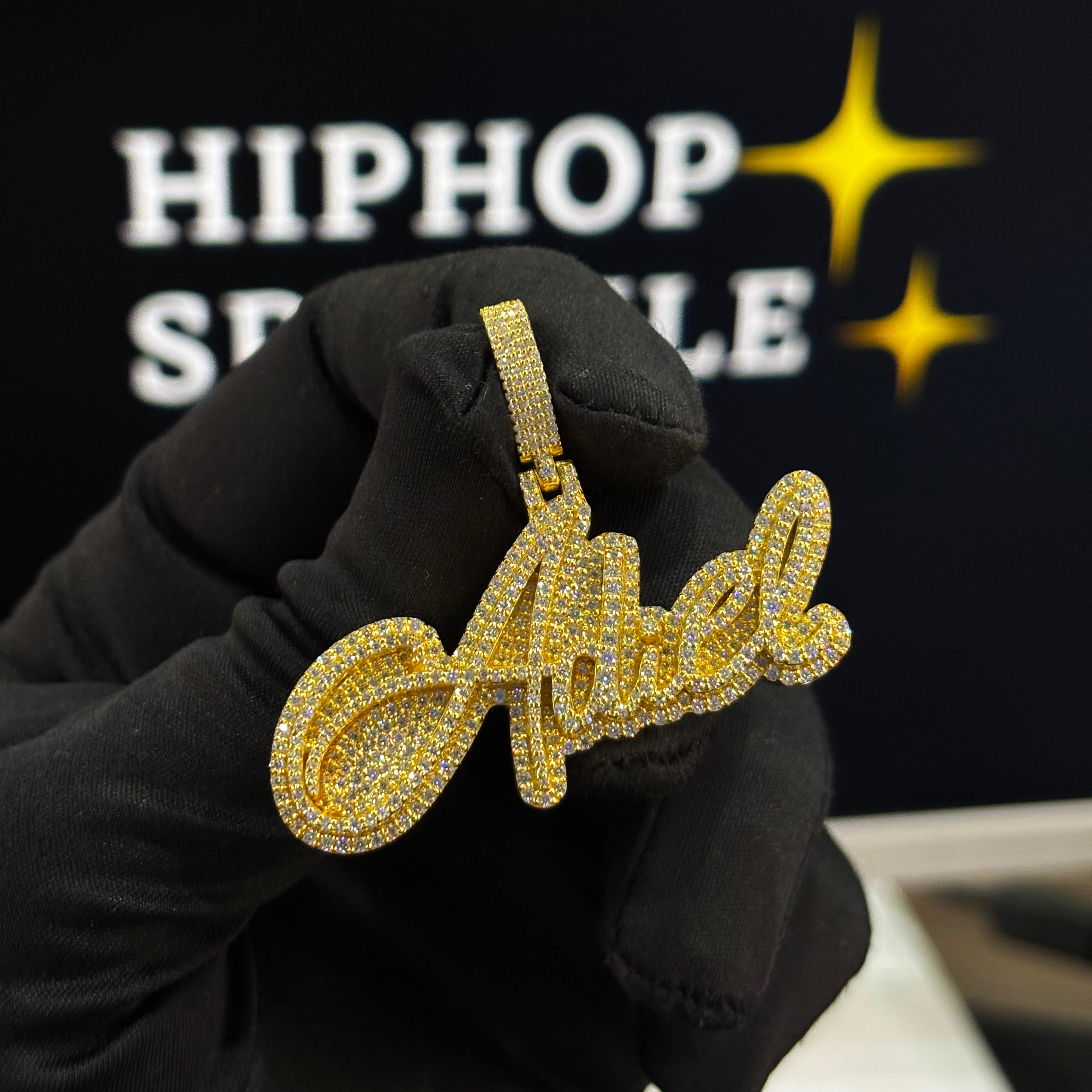 Adiel custom name pendant, iced out hip hop jewelry in 2 inch size with moissanite diamonds.