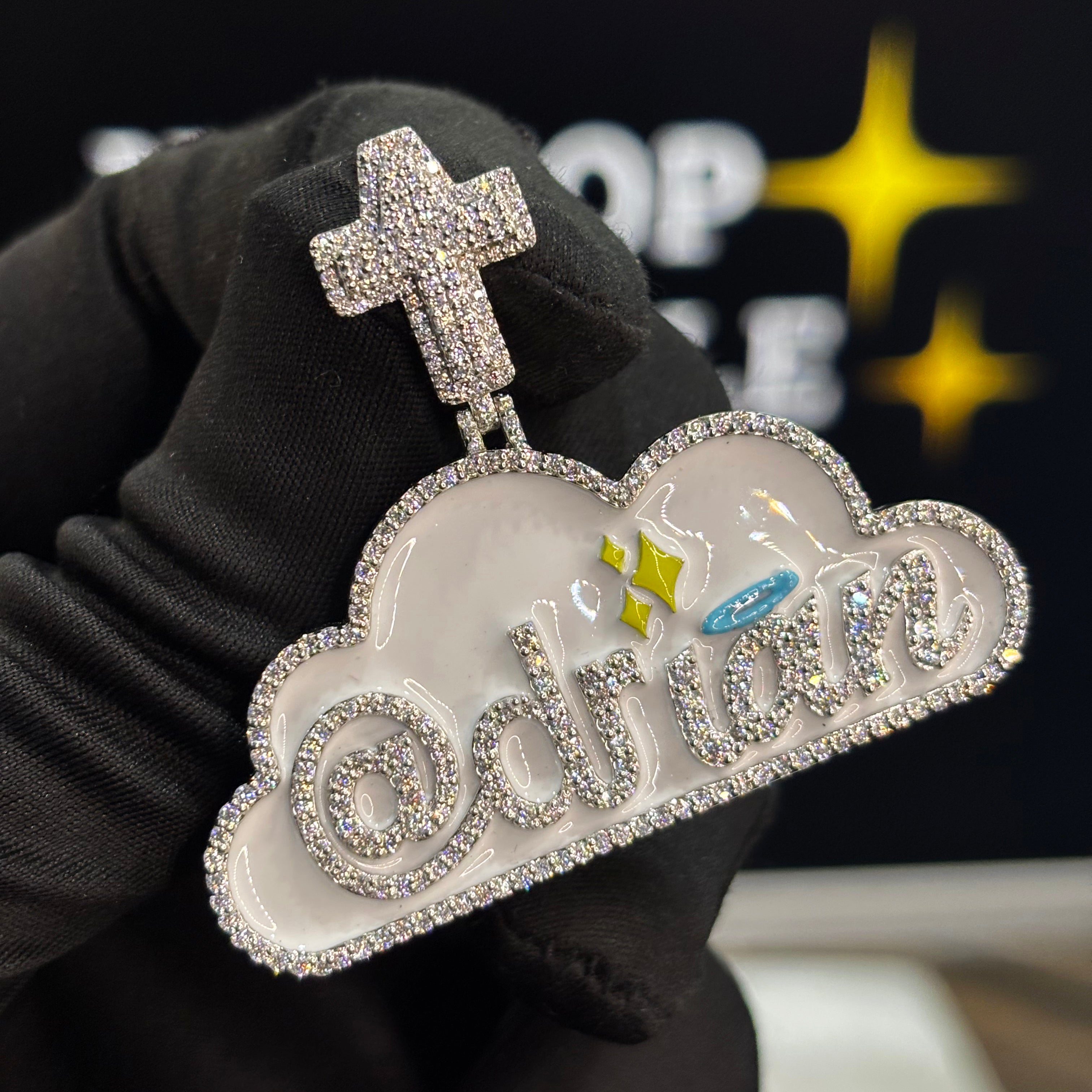 @drian custom pendant in cloud shape with white enamel and cross bail, iced out hip hop jewelry in 2 inch size with moissanite diamonds.