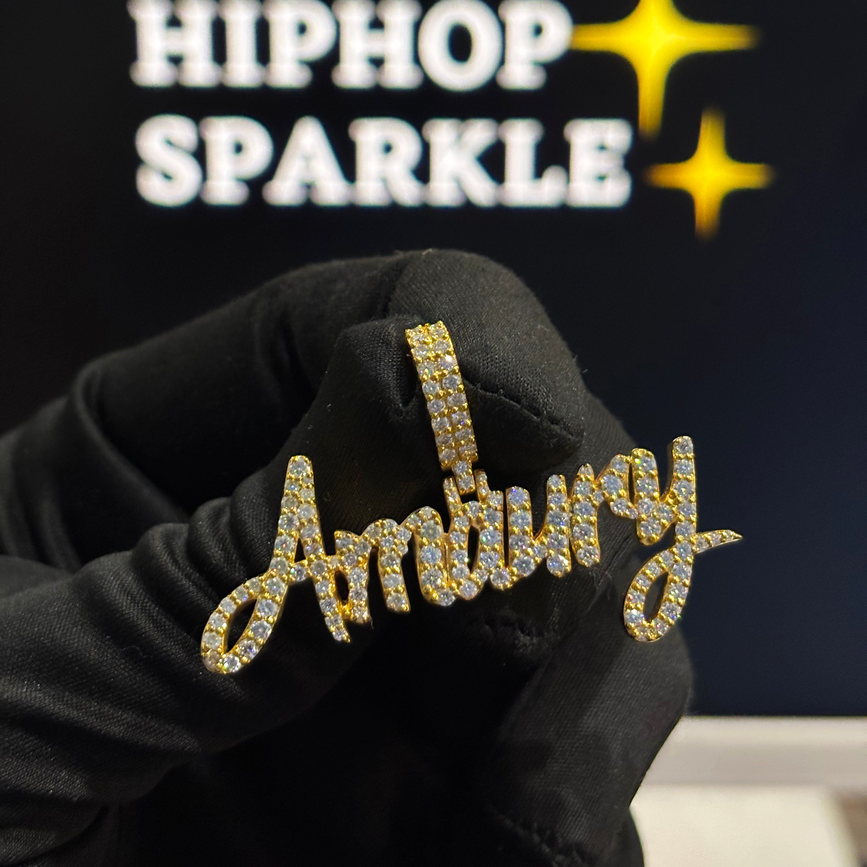 Amaury custom name pendant, 2 inch iced out hip hop jewelry in 925 silver with moissanite diamonds and gold plating.