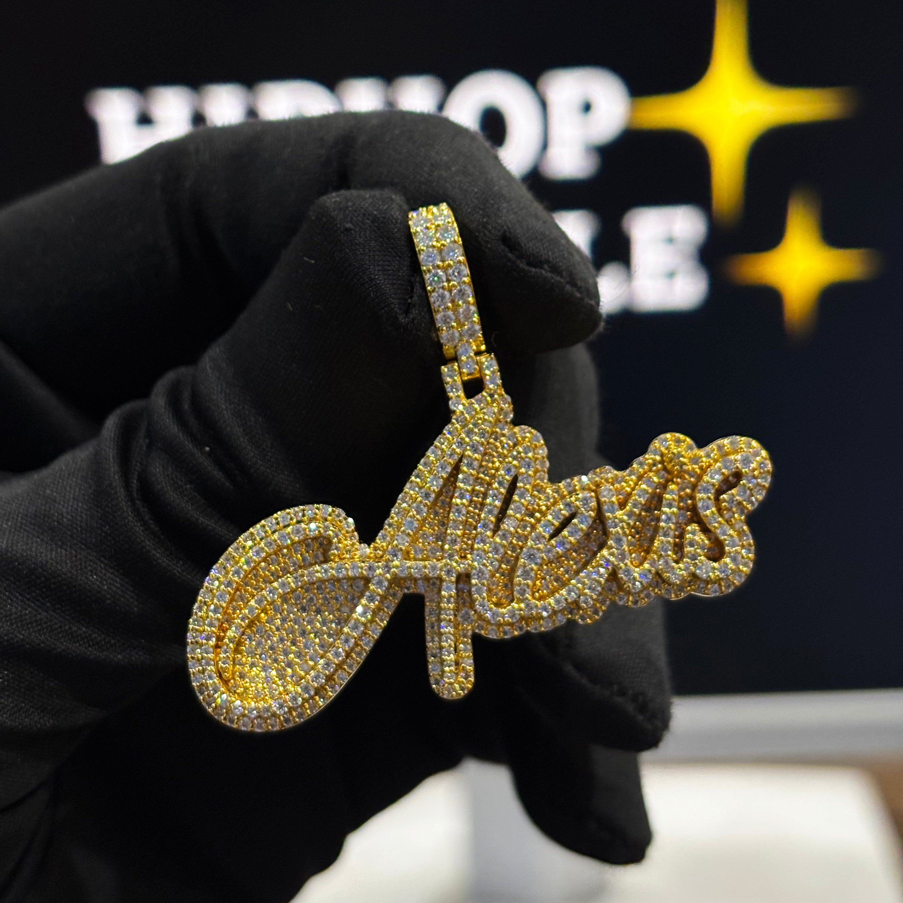 Alexis custom name pendant, 2 inch size, cursive letters, iced out with VVS moissanite diamonds, hip hop jewelry.