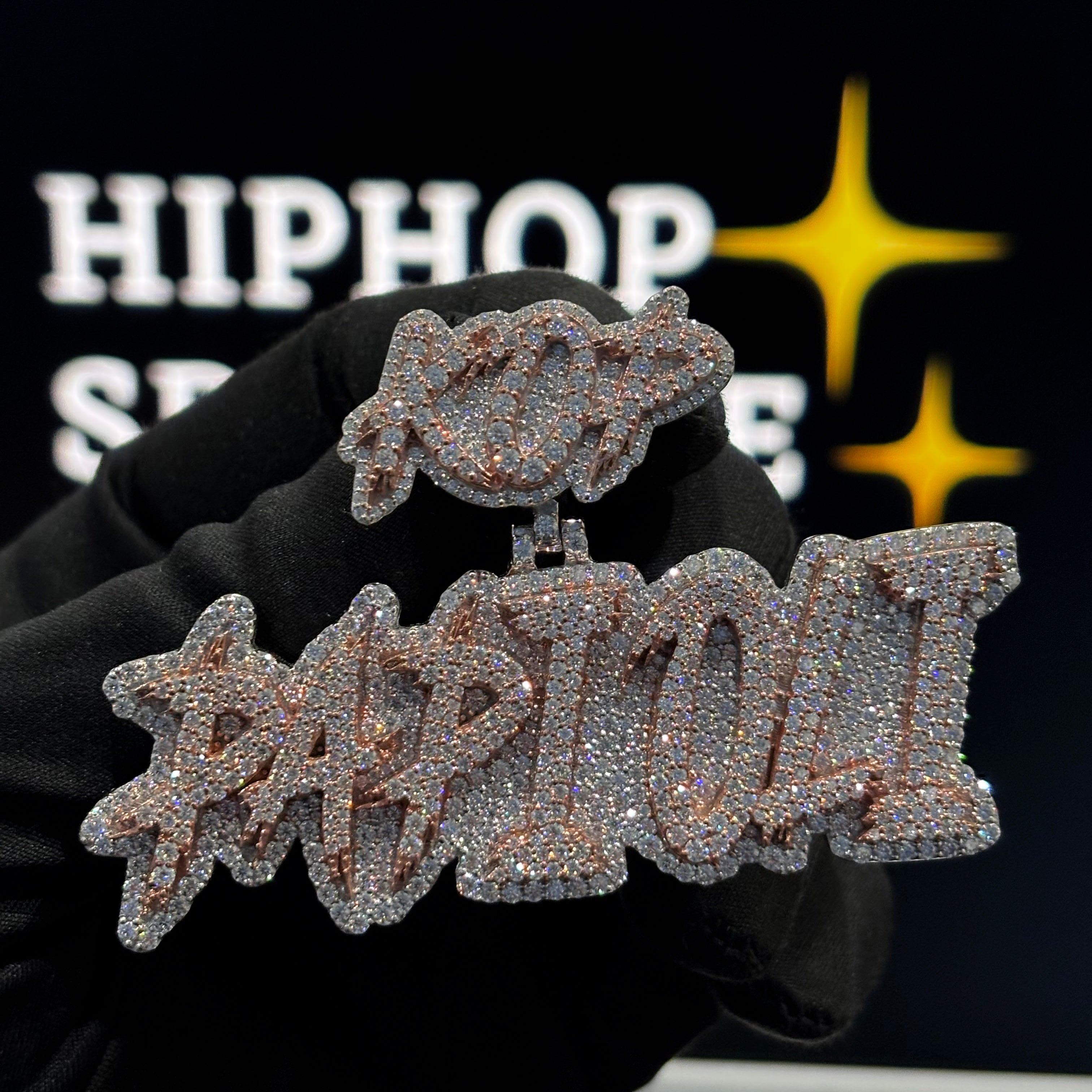 Two tone Papioli custom name pendant iced out with rose and white gold finish and moissanite stones